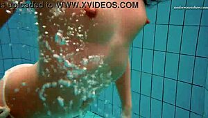 Big tits bouncing in the pool 